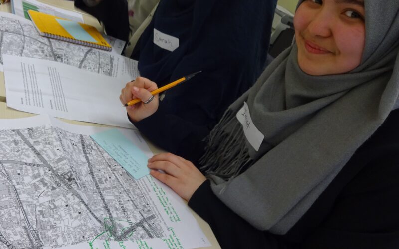 Young people researching trail