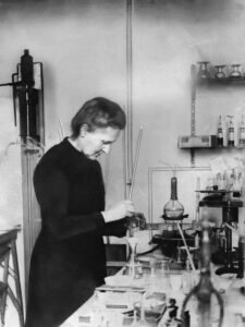 Image of Marie Curie in a labatory