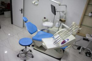 Image of dentist chair with dental tools