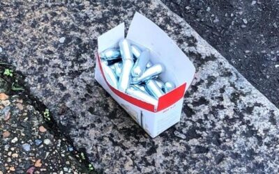 How does nitrous oxide damage nerve cells?