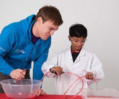 Child completing the blood pressure demonstration