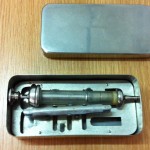 Picture of Metal and glass syringe