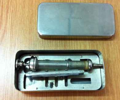 Picture of Metal and glass syringe