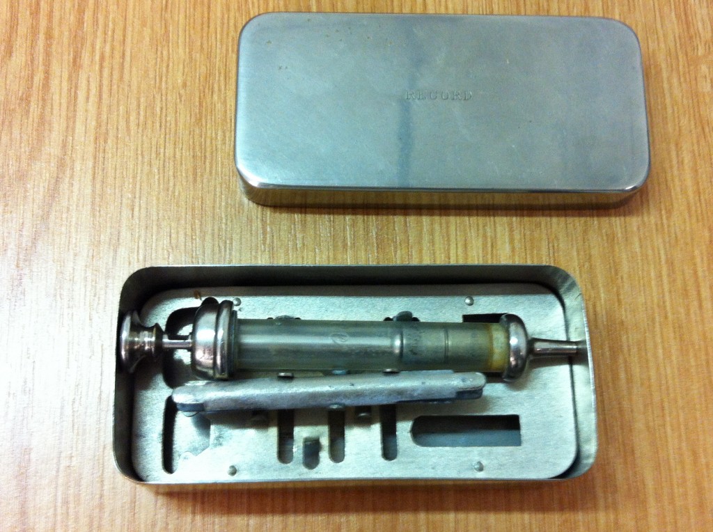 Picture of Metal and glass syringe
